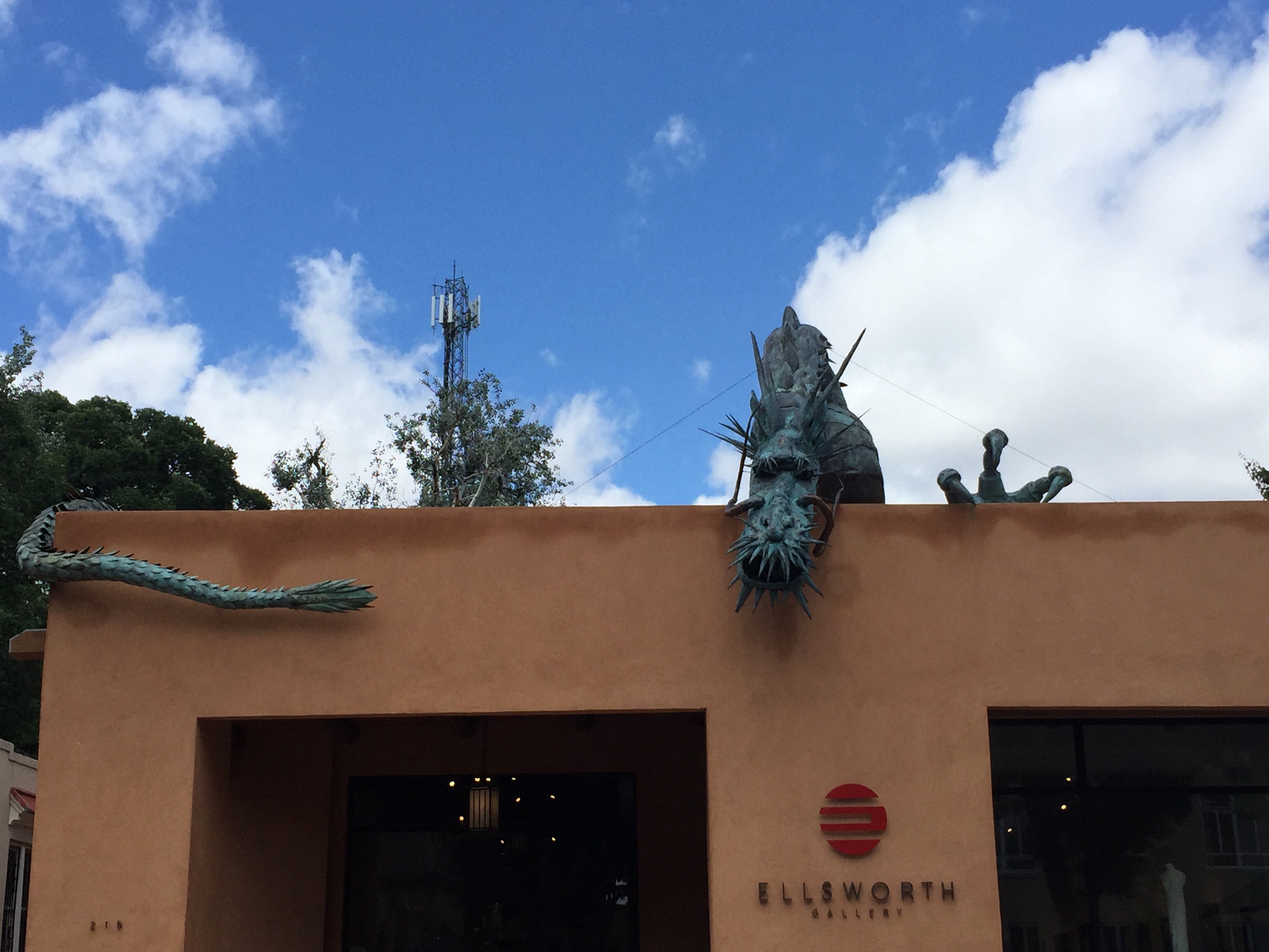 Dragon sculpture on top of an art studio